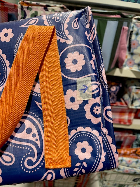 Back of tote's seam is slightly bulging outwards.