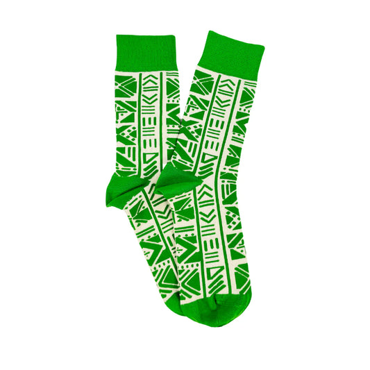 Green and white patterned socks on a white background