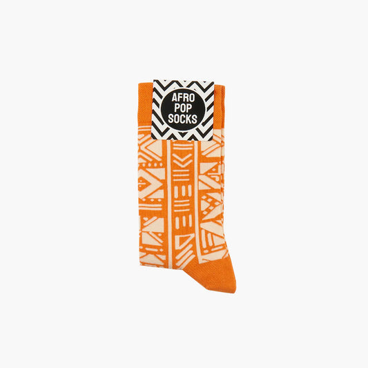 Orange and white patterned sock with 'Afro Pop Socks' label on a white background