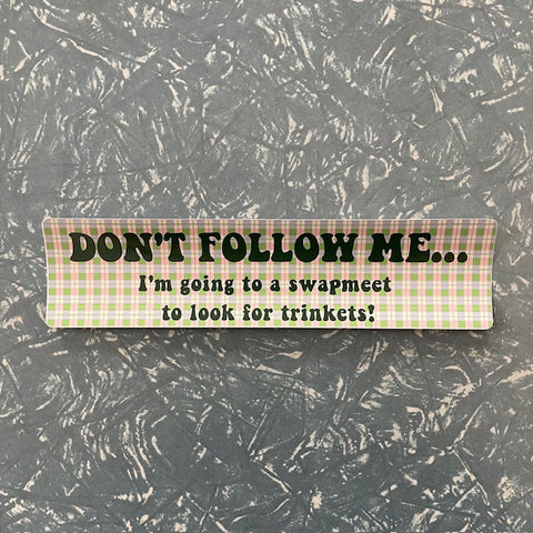Carla Adams Swapmeet Bumper Sticker. Text reads "Don't Follow Me... I'm going to a swap meet to look for trinkets!"