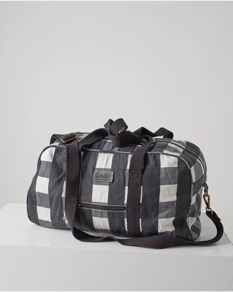 Side view of Kip & Co Black & White Gingham Duffle Bag