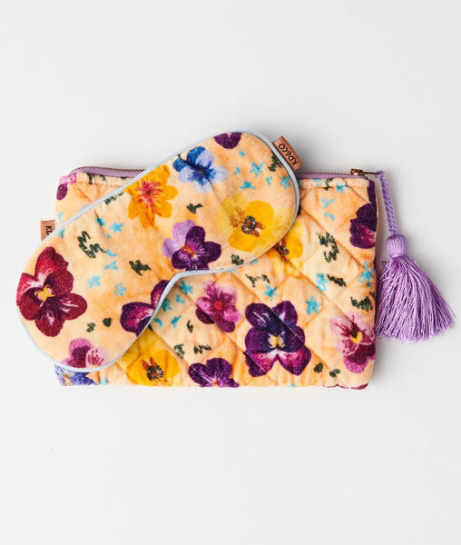 Kip & Co Pansy Velvet Eye Mask styled with its pouch