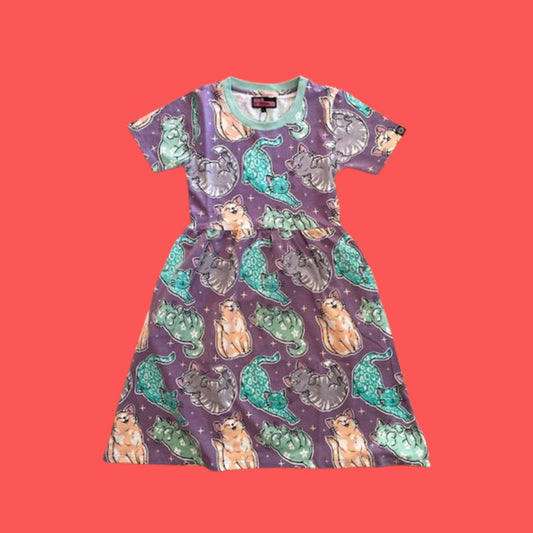 Jersey shirt dress in lilac purple with colourful cat illustrations on coral red background