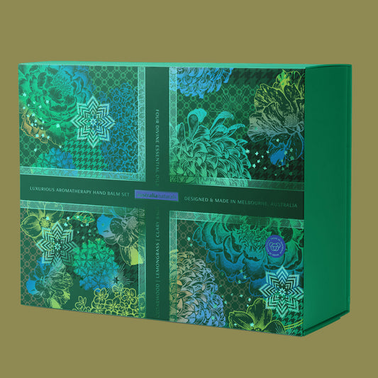 Green decorative box with floral patterns on a white background