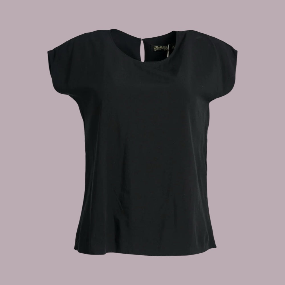Olga de Polga Rhea Tee Black in Tencel. Black short sleeved tee on a white background.