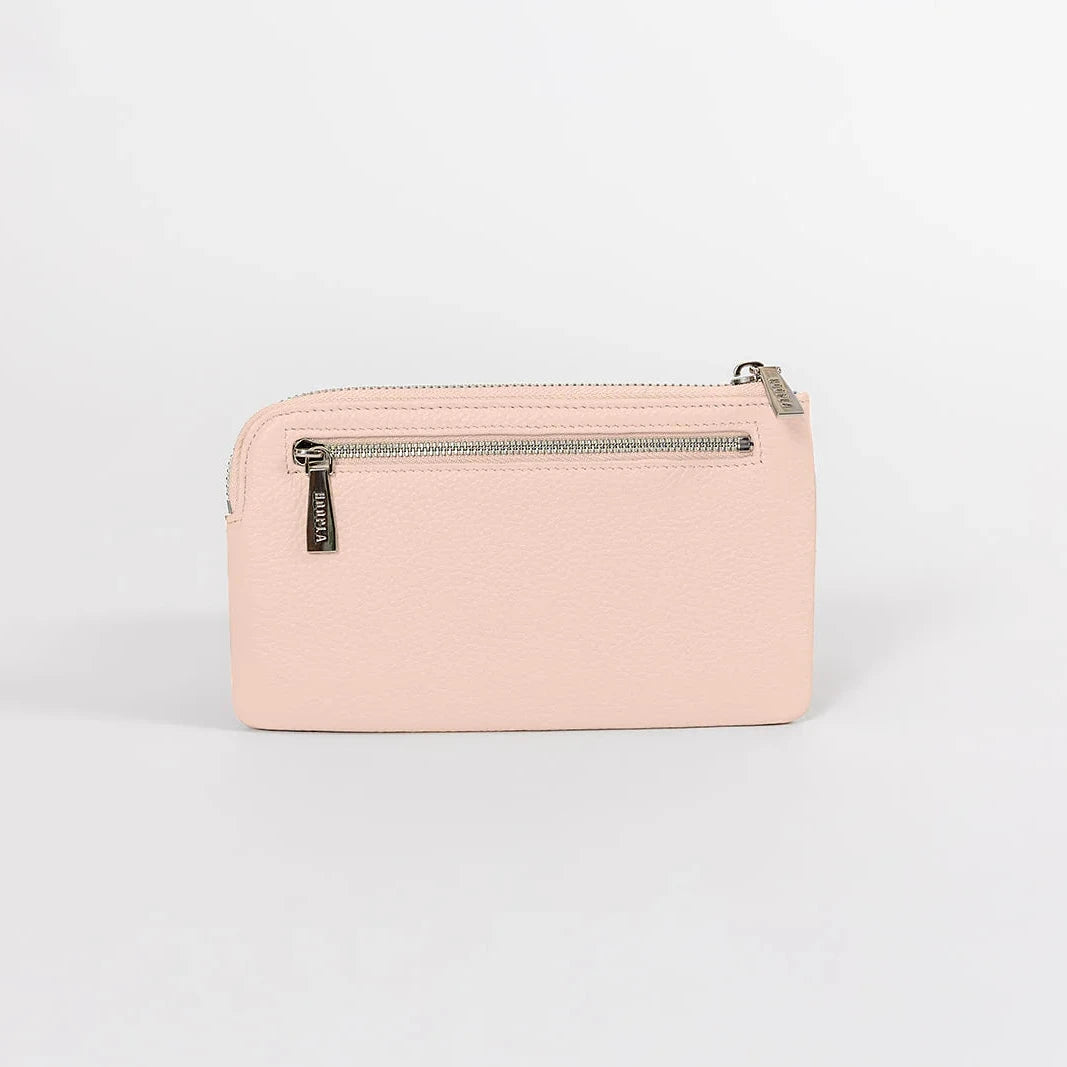 Pink wallet with a zipper on a light gray background