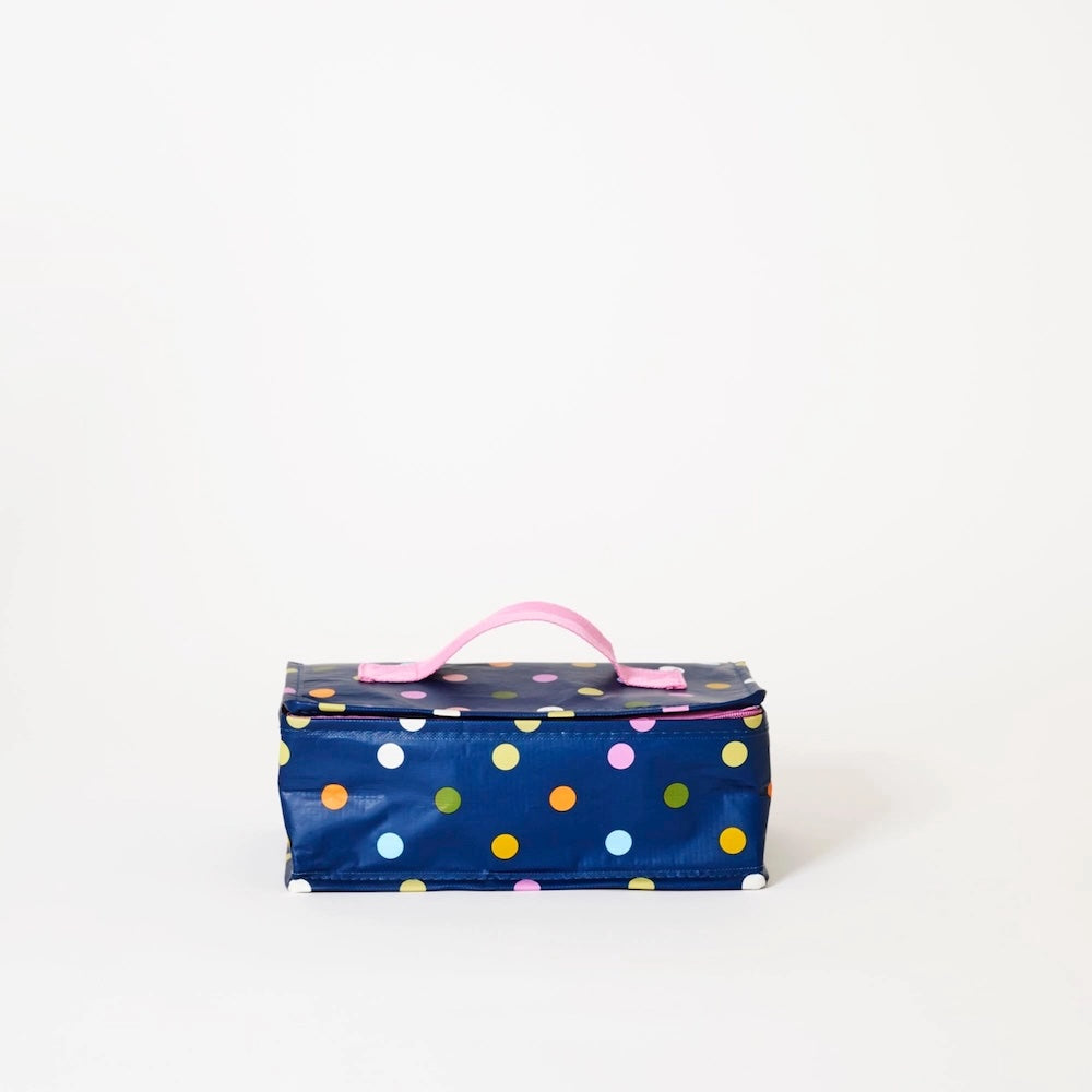 Polka dot lunch bag with pink handle on a white background