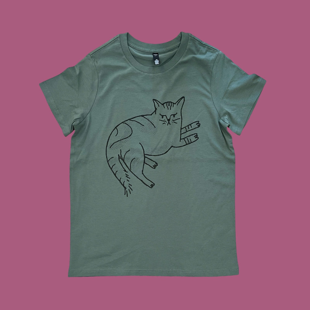 Green t-shirt with a cat graphic on a pink background