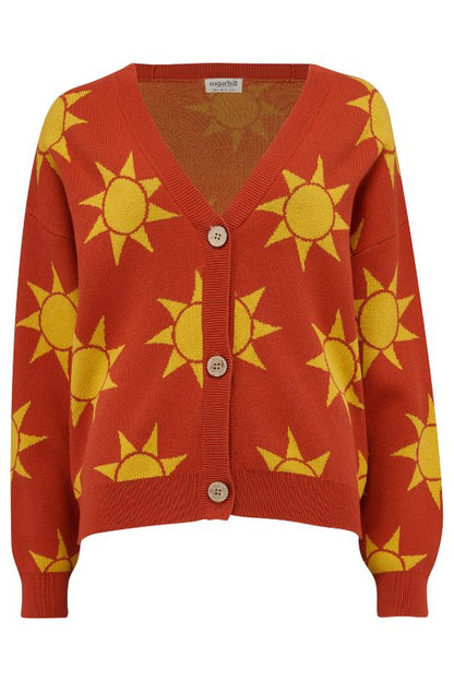 Red cardigan with yellow sun patterns on a white background
