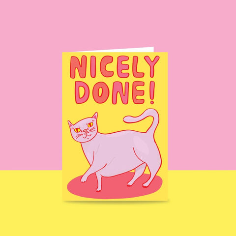 Able & Game Nicely Done! Card features hand drawn bubble text reading "Nicely Done!" and a cat below the text.