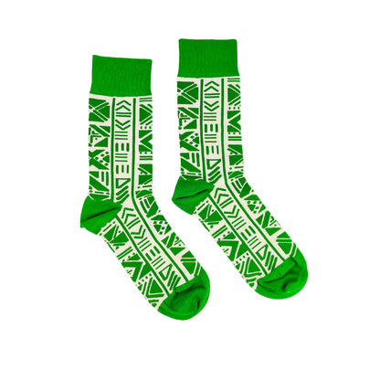 Green socks with white pattern on a white background