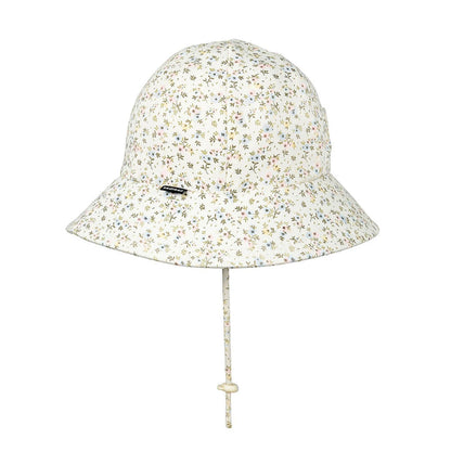 Side view of Floral patterned bucket hat with a strap on a white background
