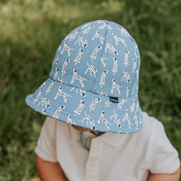 Front view of Bedhead Dalmatian Bucket Hat for 1-2 years worn by a young model