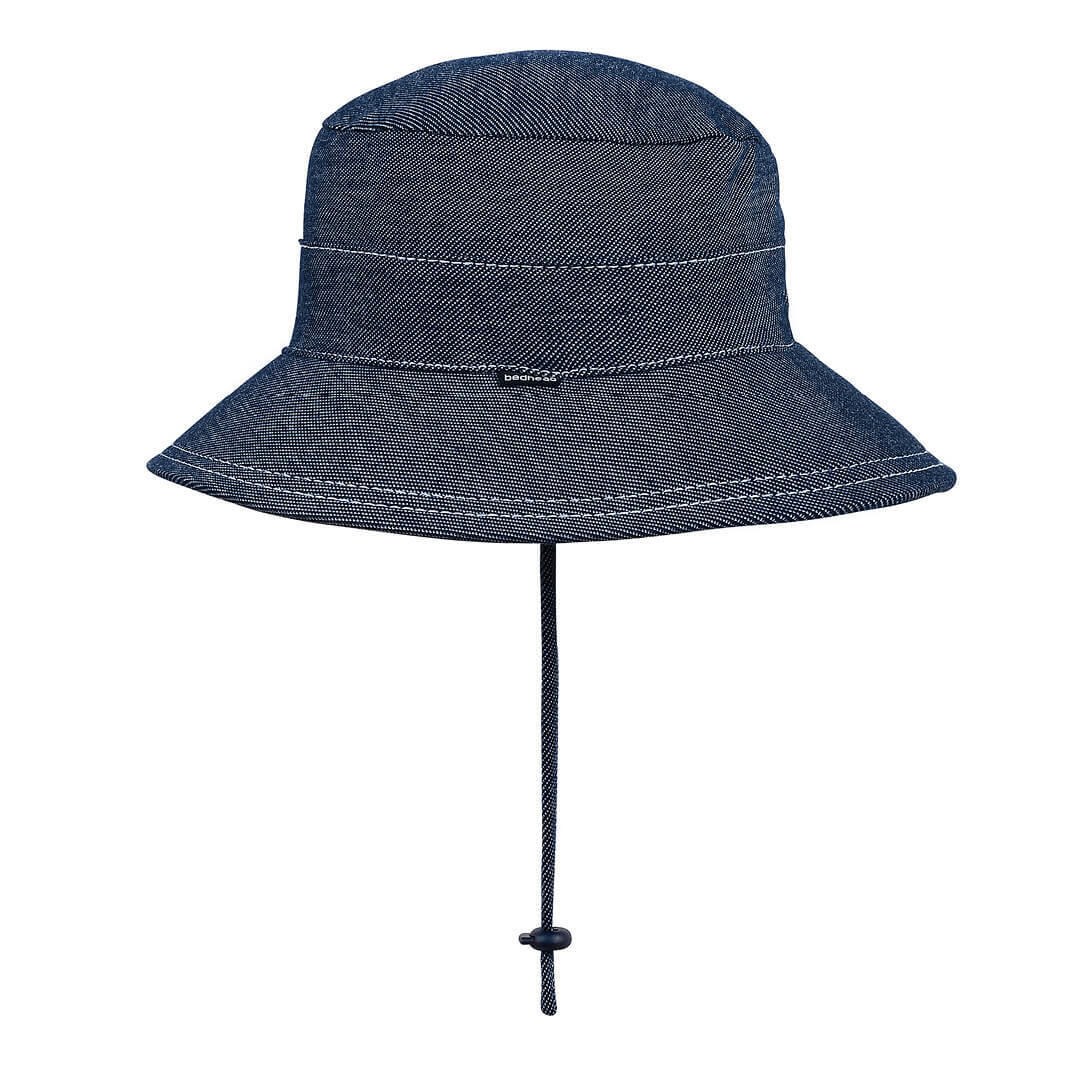 Side view of Blue-black denim bucket hat with a chin strap on a white background