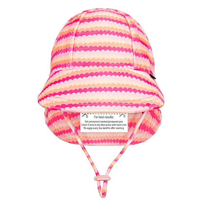 A pink and peach scalloped striped swim hat with a chin strap, shown against a plain white background.