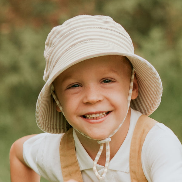 Front view of Bedhead Natural Stripe Bucket Hat worn by young model