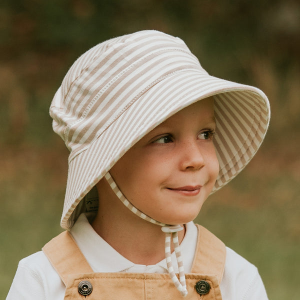 Side view of Bedhead Natural Stripe Bucket Hat worn by young model