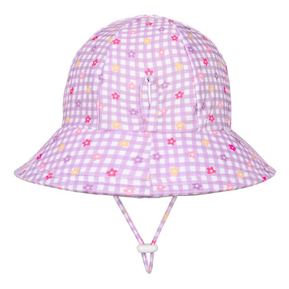 A light purple and white gingham swim bucket hat with small multicolour floral accents, featuring an adjustable chin strap with a white toggle, shown against a plain white background.