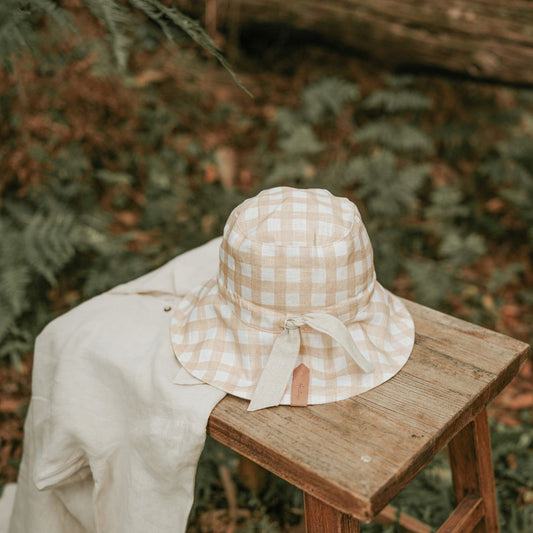 Flat lay of Bedhead Vacationer Reversible Adult Sun Hat in Flynn / Flax