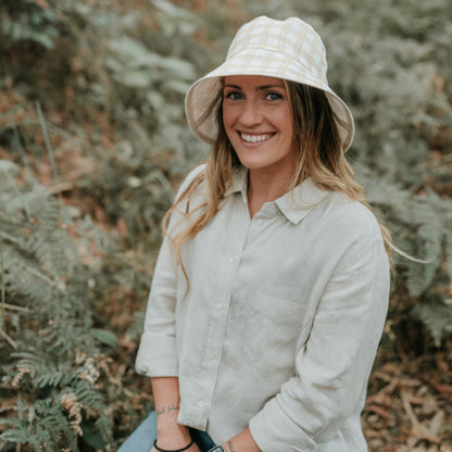 Bedhead Vacationer Reversible Adult Sun Hat in Flynn / Flax, worn by model