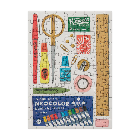 Mini puzzle with stationery-themed design featuring various stationery items on a white background