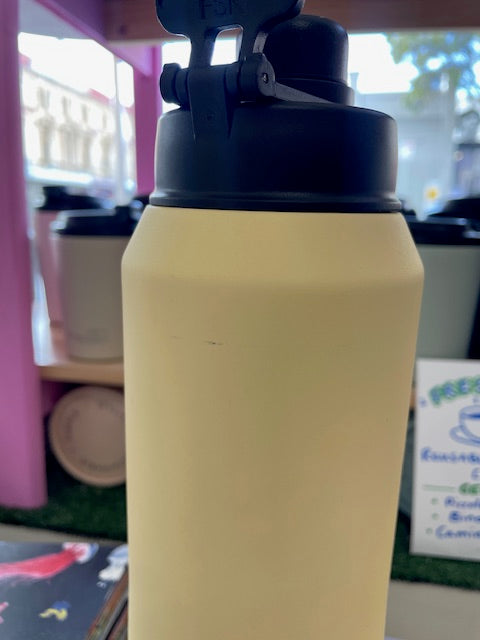 A scratch across the body of the bottle