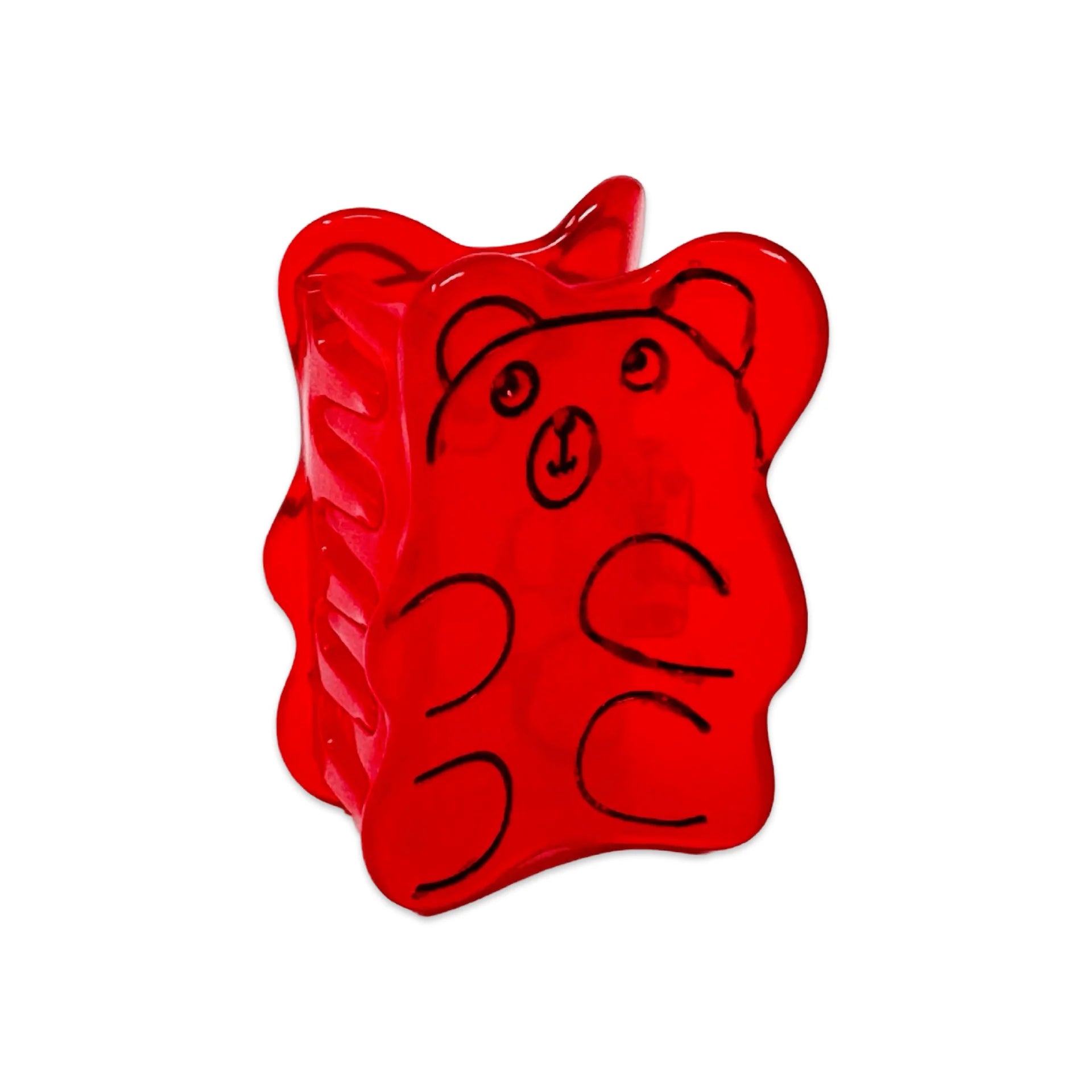 Red gummy bear hair clip with black outlines on a white background