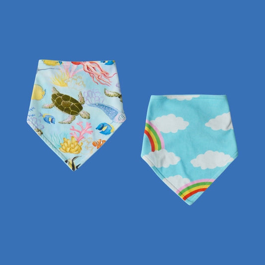 Kip & Co Beach Baby Organic Cotton Dribble Bib Set of 2 featuring bibs in Reef Life and Cloudy Days.