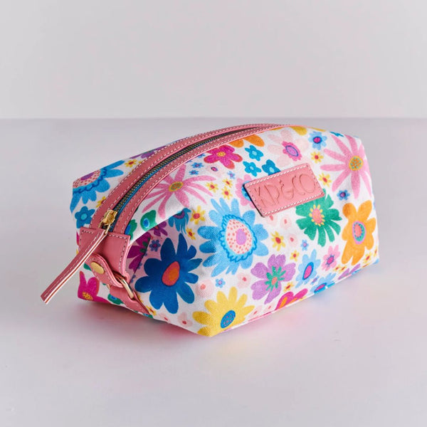 Side view of Kip & Co Rainbow Flowers Toiletry Bag