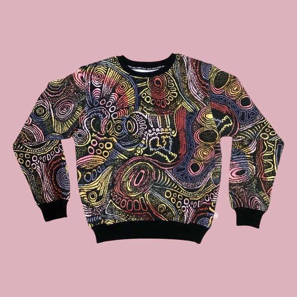 Flat lay of Kip&Co X Ernabella Arts Tjala Tjukurpa Adult Organic Cotton Sweater