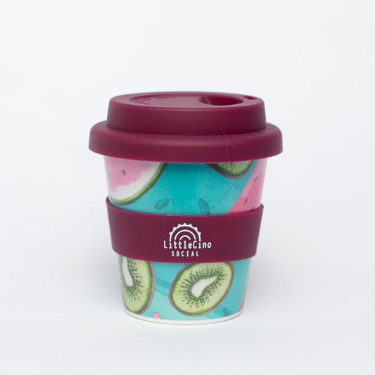 Reusable baby cino cup from Little Cino Social with a colorful design and purple lid on a white background