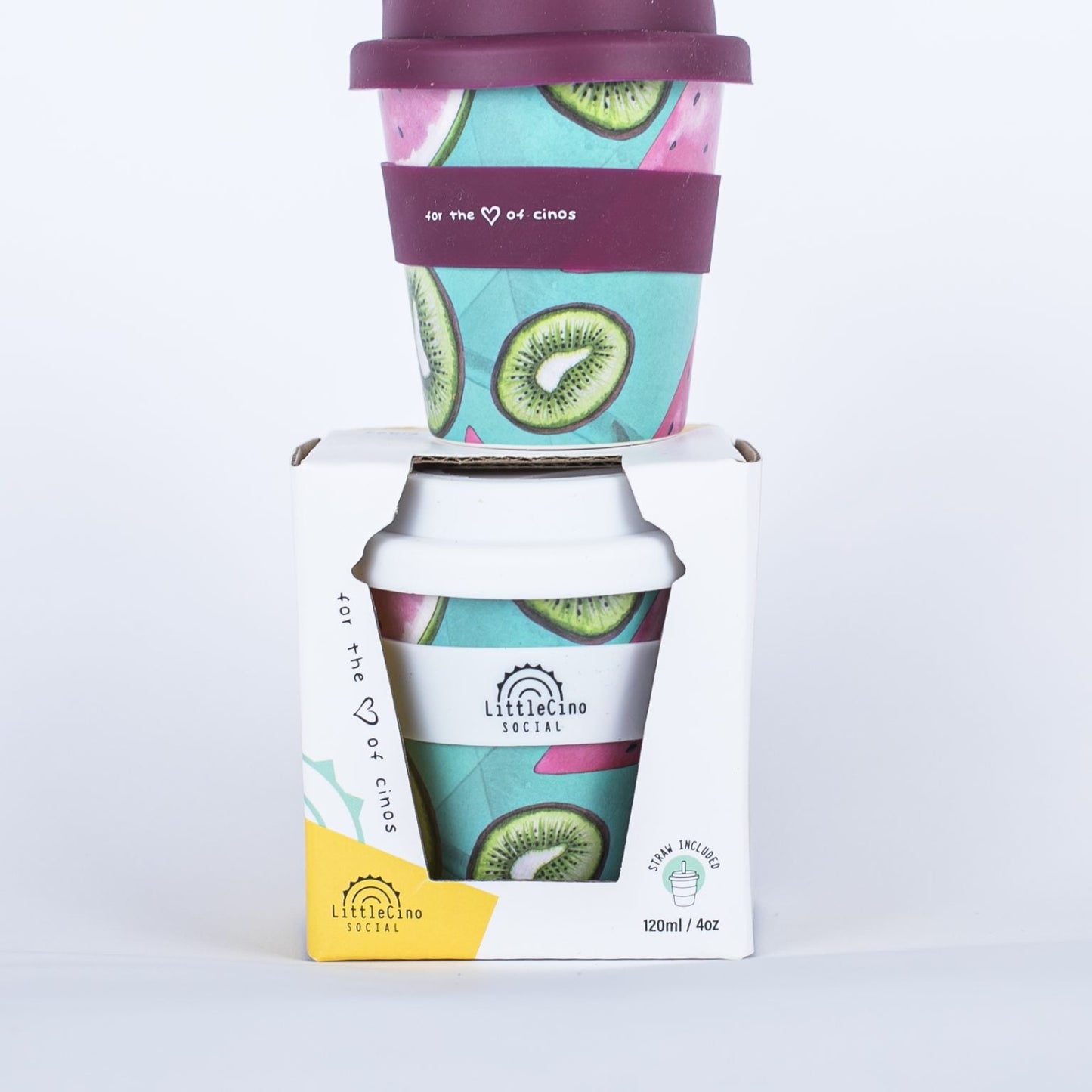 Little Cino Social reusable babycino cup with kiwi pattern and matching box on a white background