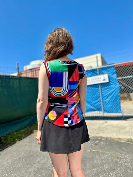 Back view of Nooworks Ansley Muscle Tee worn by model 