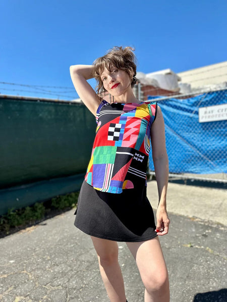 Nooworks Ansley Muscle Tee worn by model with one hand on the back of her head holding up her hair.