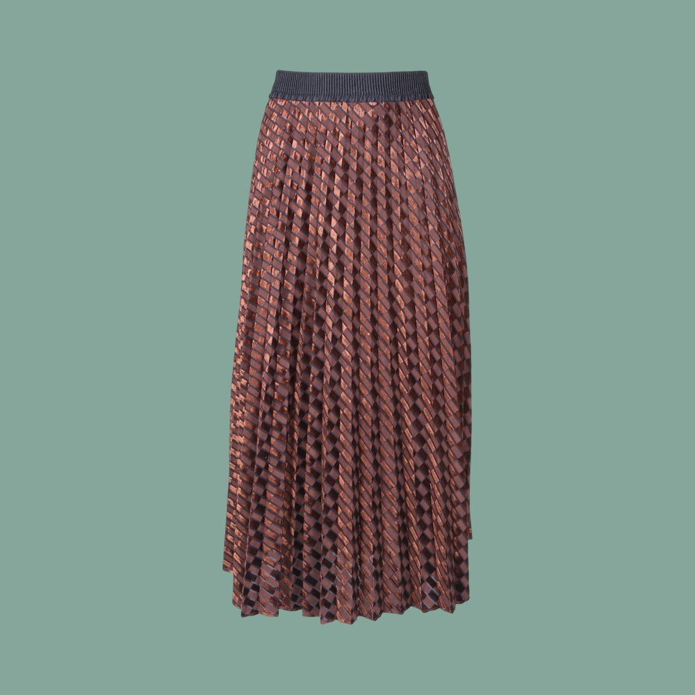 Brown metallic textured pattern skirt on a green background