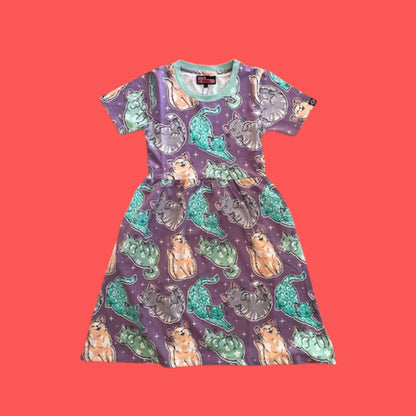 Jersey shirt dress in lilac purple with colourful cat illustrations on coral red background
