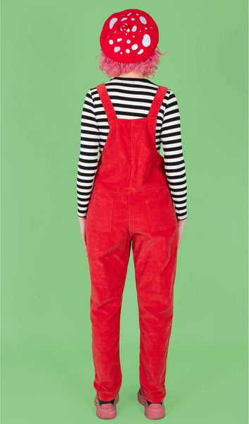 Back view of model wearing Run & Fly Red Cord Dungarees with a black and white striped long sleeved top underneath.