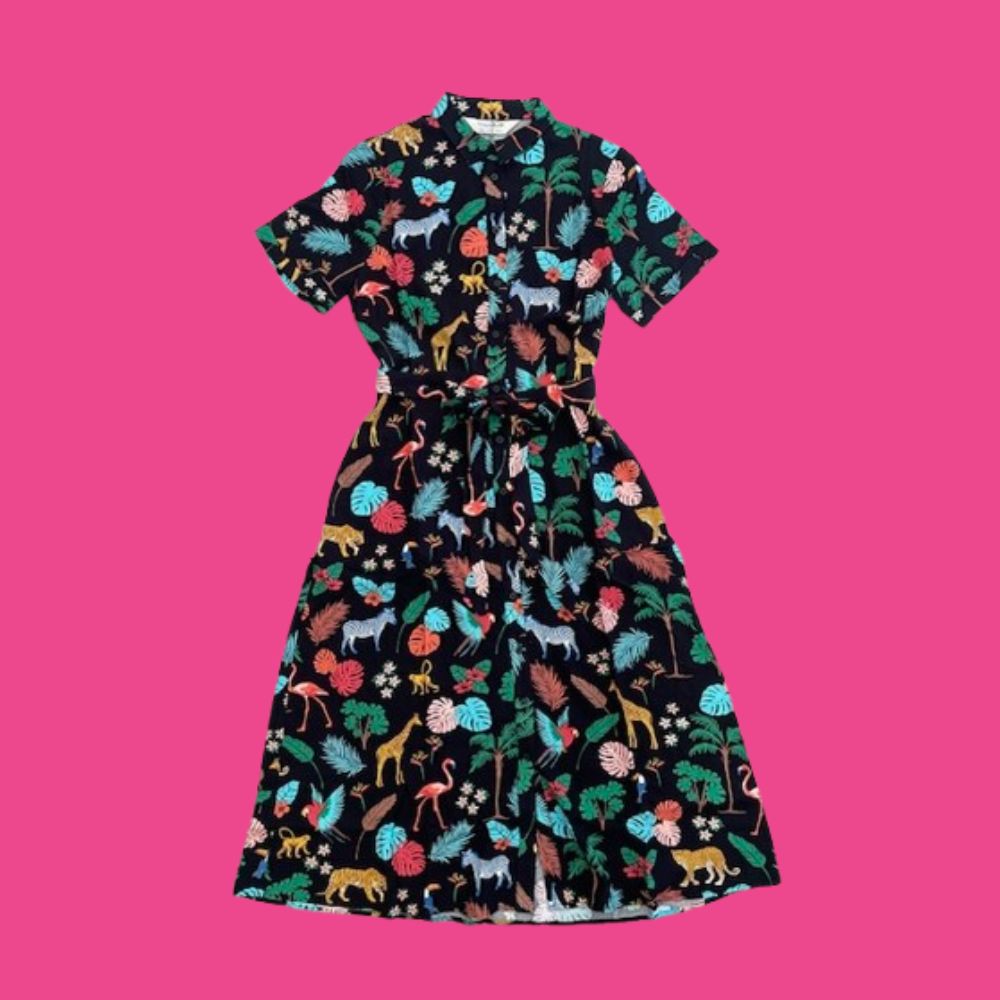 Dress with colorful animal pattern on a pink background